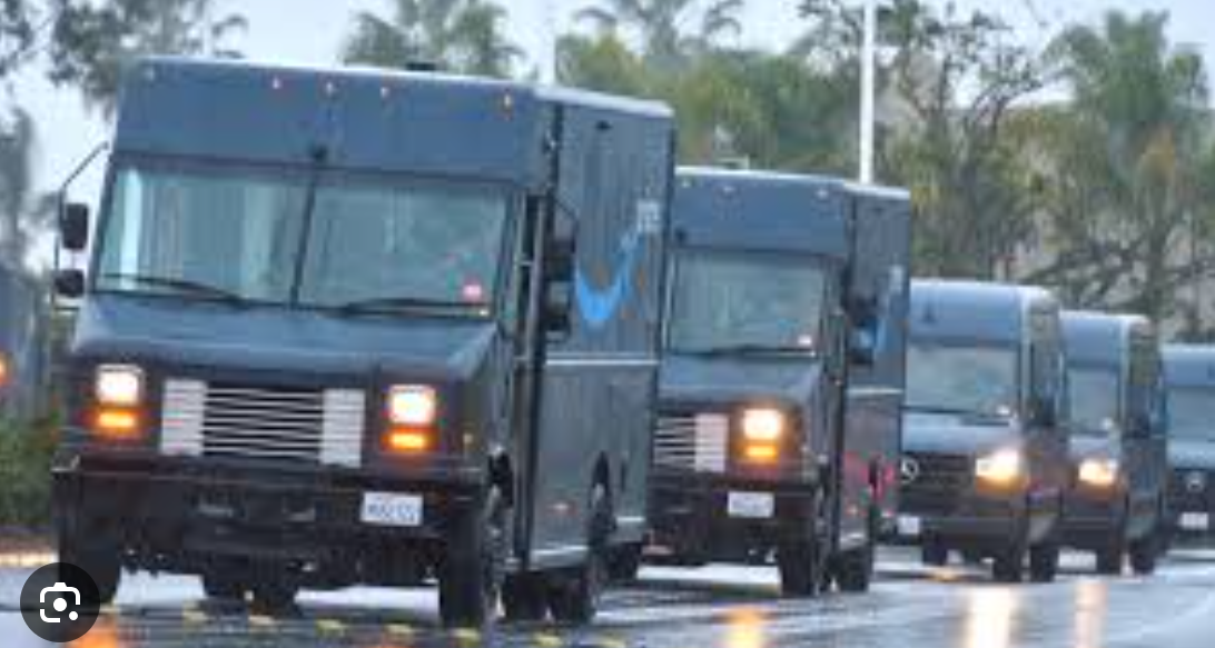 Amazon vans in convoy